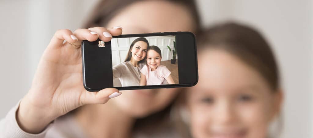 If you see your child covering their nose in group photos, you had better know what it means
