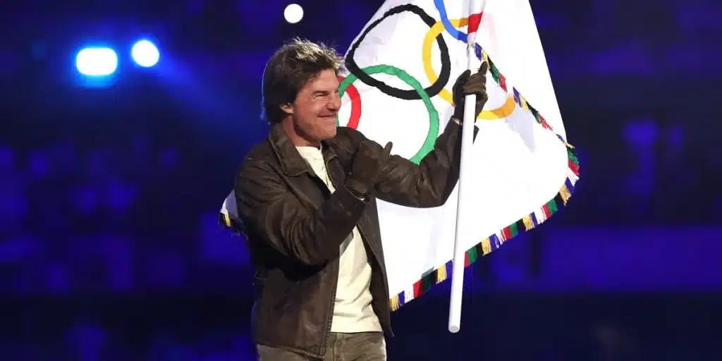 ‘Embarrassment’ or ‘Best Part’: Tom Cruise Flies to Carry Olympic Flag at Closing Ceremony, Sparking a Stir