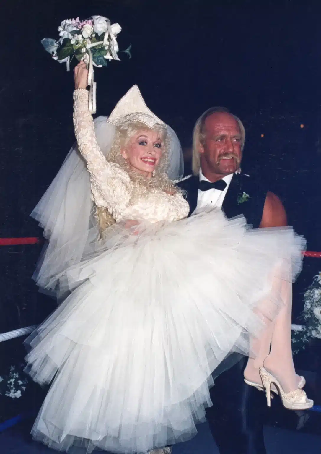 Dolly Parton and Hulk Hogan “married” in a wild in-ring ceremony that no one could believe was actually broadcast live. And yes, there was Spandex, screaming, and a song called “Headlock on My Heart”!.