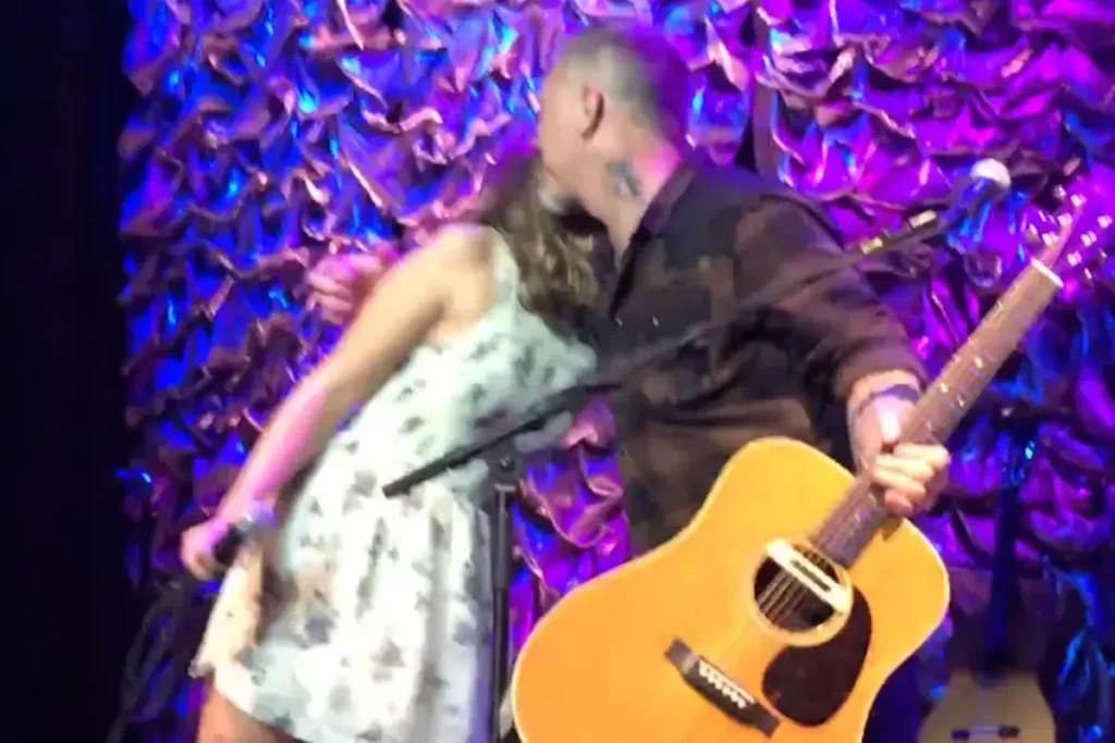 “Say Hi To My Beautiful Daughter, Cali.” James Hetfield Melted The Crowd’s Heart. As Cali Stepped On Stage, Nervous Yet Radiant, The Metallica Frontman Shed His Rock Star Armor To Become Just A Dad — Guitar In Hand, Love Overflowing From His Eyes. What Followed Was A Breath-Stealing Moment Of Pure Vulnerability: A Gentle, Acoustic Rendition Of Adele’s “Crazy For You.” Cali’s Soft, Honest Voice Trembled Through The Air As She Sought Comfort In Her Father’s Steady Gaze. James Returned Her Look With Unwavering Pride And Silent Emotion That Spoke Volumes. Fans Came For Rock, But Witnessed A Tender Father-Daughter Bond That Transformed The Massive Arena Into An Intimate Sanctuary — A Powerful Reminder That Behind Every Legend Is A Heart That Beats Fiercely For Family