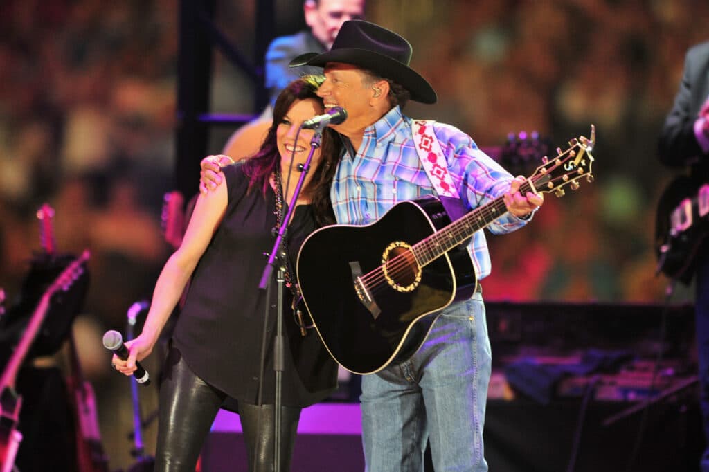 Martina McBride could barely contain her laughter on stage with George Strait and the crowd lost their minds watching the King of Country break character.