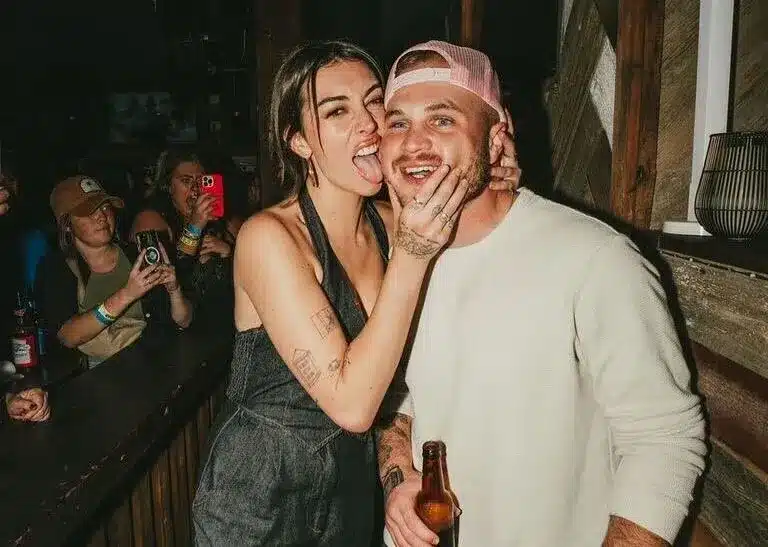 Zach Bryan Sparks Controversy With Barstool Flag Burning; Ex Brianna “Chickenfry” LaPaglia Responds