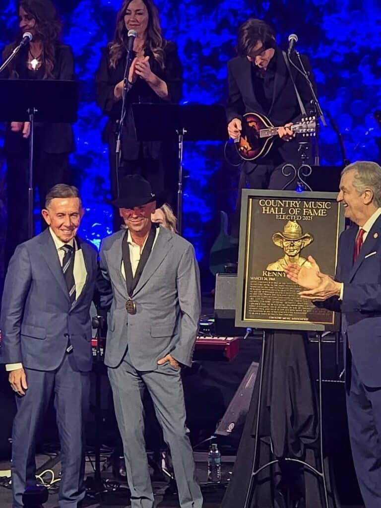 Kenny Chesney breaks down in tears as Kelsea Ballerini, Megan Moroney, and Eric Church ambush his Hall of Fame induction with emotional tribute performances.