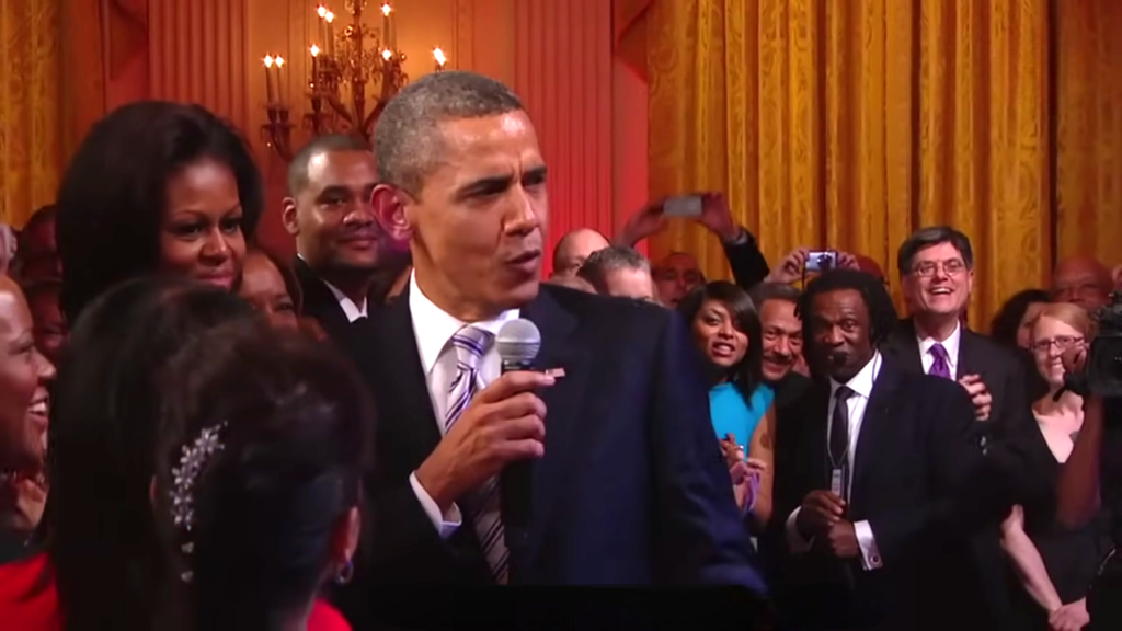 ‘C’mon, Mr. President, sing one!’” Buddy Guy teased with a grin — and that’s when it happened. 🎤 Before anyone could blink, Barack Obama took the mic and began to sing “Sweet Home Chicago.” The East Room of the White House — glowing under crystal chandeliers and filled with living legends like B.B. King, Buddy Guy, and Mick Jagger — exploded in cheers and laughter. Obama’s voice wasn’t perfect, but it was authentic. The crowd felt every note, every ounce of joy, every bit of Chicago pride pouring from his heart. “That’s my hometown,” he said, flashing that famous smile — and for a moment, even the Secret Service seemed to sway along. That brief 36-second performance became one of the most unforgettable moments in presidential history — proof that even in the heart of politics, music still has the power to bring the world to its feet.