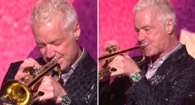 ‘This one’s for you, Maestro…’” Chris Botti whispered softly before lifting his trumpet beneath the golden lights of the Kennedy Center. And then — silence. One note, trembling with emotion, filled the hall and wrapped every heart in its warmth. His tribute to the legendary Arturo Sandoval wasn’t just music — it was a confession of love, gratitude, and legacy. “You taught me that music isn’t about perfection,” Botti once said, “it’s about truth.” Each note seemed to echo those words, rising higher, shimmering like a prayer. Sandoval, the Cuban defector who once risked everything for freedom, sat motionless — his eyes glistening. When the final note faded, he stood, whispering through tears, “You made me proud, my son.” It wasn’t just a performance. It was a passing of the torch — a moment where friendship, respect, and the soul of jazz itself met under one shining stage