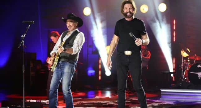 “THIS SONG REMINDS ME WHO I AM,” Ronnie Shouted as His Voice Trembled Across the Quiet, Golden Stage, Filling Every Heart with the Raw, Aching Truth of “Neon Moon” and Proving That Real Country Music Lives in Every Word, Every Note, and Every Story