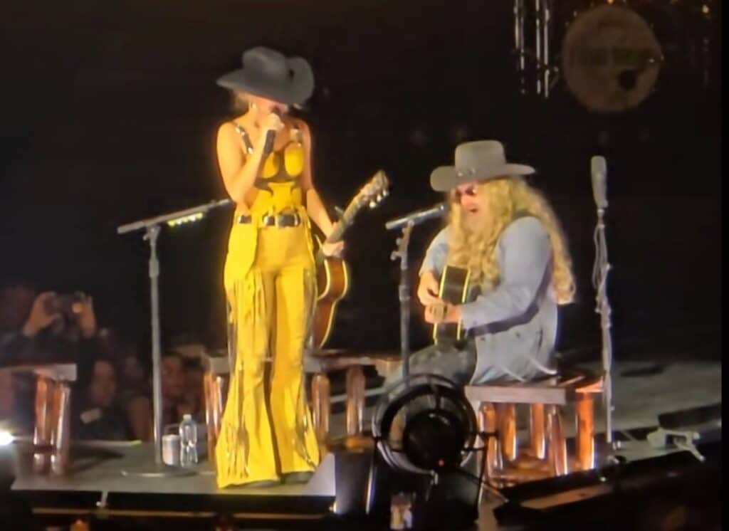 Ernest SHOCKS Lainey Wilson By Wearing Her Bell Bottoms Onstage!