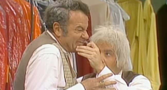 “THE FIRST LAUGH HIT LIKE LIGHTNING — AND AFTER THAT, THERE WAS NO SAVING ANYONE ON THAT STAGE.” One tiny costume mishap, one split-second misstep, and Tim Conway turned a quiet sketch into a full-scale comedic collapse that felt almost dangerous in the best possible way. The moment he began twisting and flopping around that dentist’s chair like a man possessed, the air shifted — Harvey Korman tried to stay professional, but his shoulders trembled, his lips twitched, and his eyes filled with tears he couldn’t blink away fast enough. It was over. Conway’s unexpected brilliance detonated the scene, sending both actors — and everyone watching — into unstoppable fits of laughter. Every flubbed line, every accidental poke, every wild contortion transformed into pure comedic electricity. Fifty years later, their timing still feels unmatched, their chemistry untouched, their chaos unbeatable. What was meant to be a simple sketch became a once-in-a-lifetime moment where two legends broke every rule, every script, and every straight face in sight — and somehow created comedy immortality.