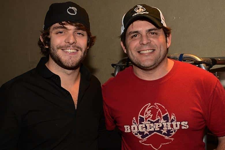 “There Were Nights I Wondered If The Fire Was Gone For Good.” Rhett Akins Let The Words Hang In The Air At The Grand Ole Opry, His Voice Trembling Just Enough To Reveal The Years He Rarely Talks About — The Quiet Seasons Of Doubt, The Long Drives Home Wondering If The Stage That Once Defined Him Had Already Moved On. “I Watched My Son Rise,” He Confessed Softly, “And I Was Proud Beyond Words… But A Part Of Me Kept Asking, ‘Did My Story Already End?’” Under Those Familiar Lights, The ’90s Hitmaker Didn’t Sound Like A Man Chasing Relevance — He Sounded Like A Man Reclaiming Himself. “I Never Thought I’d Feel This Fire Again,” Rhett Admitted, Eyes Shining As The Crowd Leaned In, “But Standing Here Tonight… It Feels Like Coming Home.” You Could See It In The Way He Gripped The Mic, In The Pause Between Breaths, In The Standing Ovation That Swelled Before He Even Finished Speaking. Fans Wiped Away Tears, Some Whispering, “We Grew Up With Him,” Others Posting Later, “This Wasn’t A Comeback — It Was A Resurrection.” What Unfolded Wasn’t Just An Announcement, But A Reckoning With Time, Legacy, And Love — A Father, An Artist, A Survivor Realizing His Best Chapters Weren’t Behind Him After All. And As The Applause Rolled Through The Opry Like A Wave Of Forgiveness And Gratitude, One Truth Rang Louder Than The Music: Some Fires Don’t Fade — They Wait