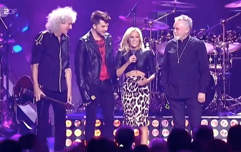 “I COMPLETELY LOST CONTROL OF MY EMOTIONS.” Helene Fischer didn’t try to hide it — she admitted it after the music stopped. When Adam Lambert stepped onto The Helene Fischer Show, nobody expected what followed. But the moment they began “Who Wants To Live Forever,” the air changed. This wasn’t a duet — it was a collision of power, vulnerability, and raw soul. Two extraordinary voices rising, breaking, and meeting in places that felt almost too intimate for television. As they climbed toward the high notes, something stunning happened. Adam’s theatrical fire wrapped around Helene’s crystalline control, and suddenly the audience wasn’t just listening — they were feeling. Faces softened. Eyes filled. Smiles trembled. You could see people realizing they were witnessing a once-in-a-lifetime moment unfold in real time.