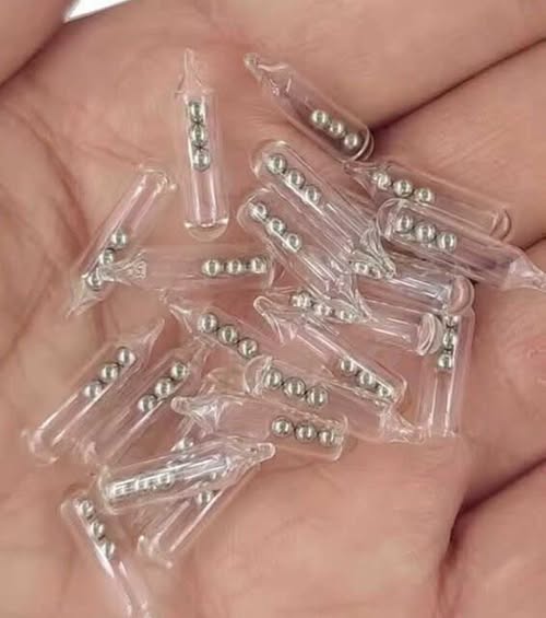 Uncovering the Purpose of Vintage Glass Tubes Found in Antique Machinist Tool Collections