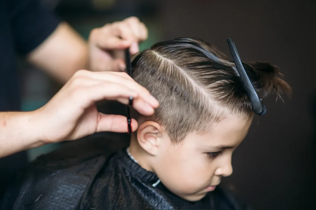 My 8-Year-Old Son Came Home from the Barber with Only Half His Hair Cut – When the Crying Barber Told Me Why, I Went Pale