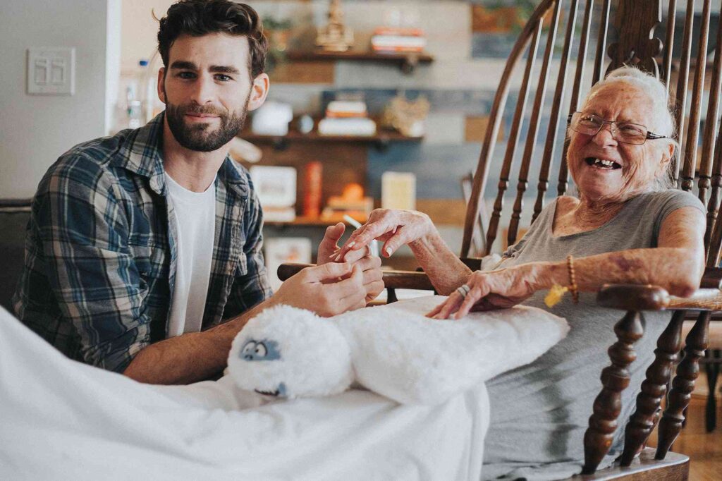 A 31-Year-Old Bachelor Brought His Bedridden 76-Year-Old Neighbor Into His Home – And What He Whispered to Her Every Night Left the Whole Family Weeping
