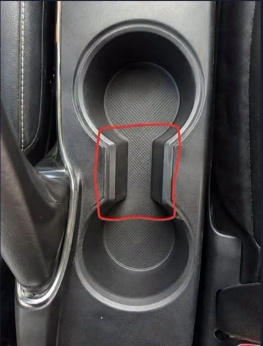 Most Drivers Never Realize What That Small Gap in a Cup Holder Is For
